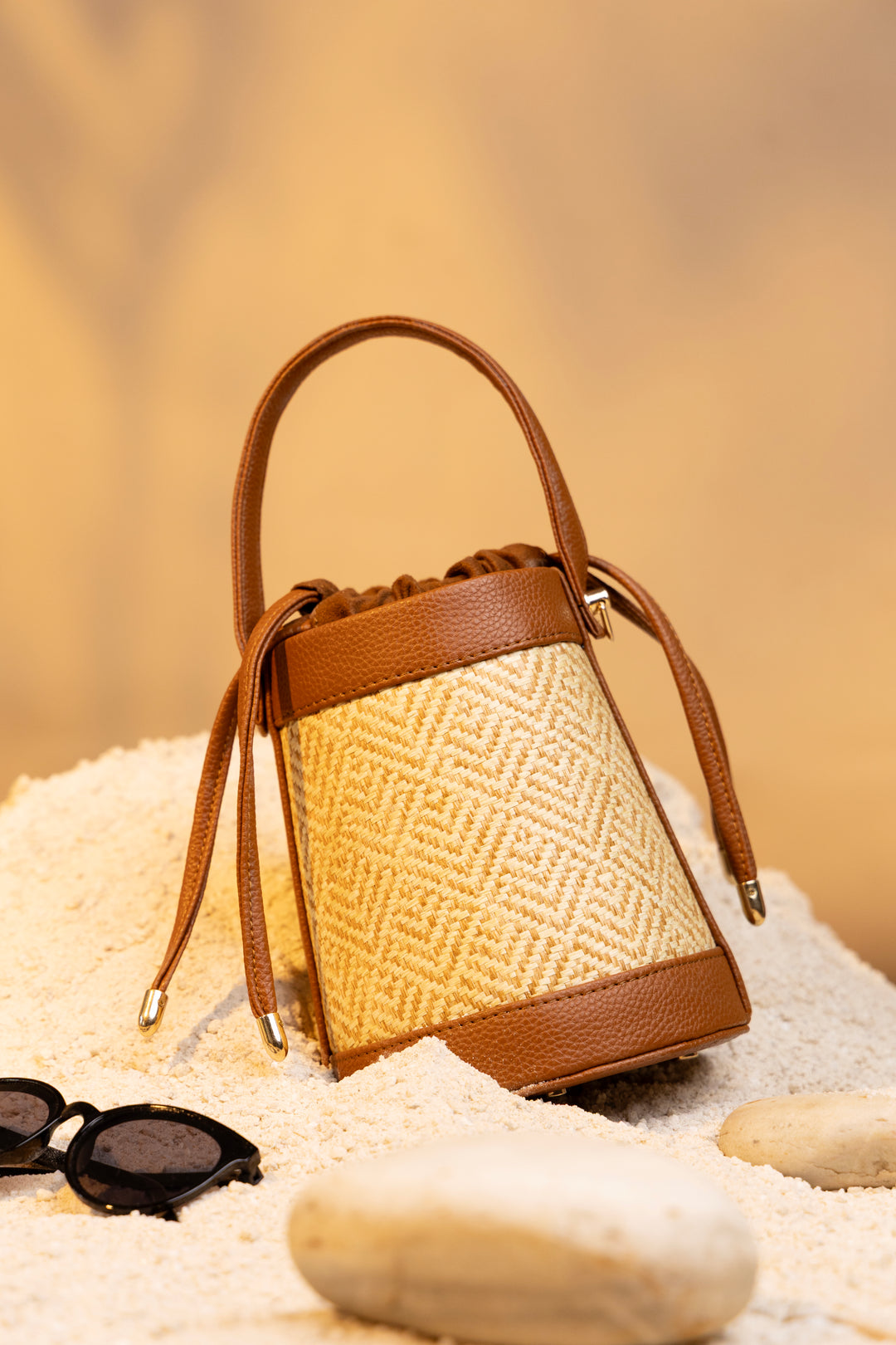 The Amara Bucket – Woven Bamboo Cane & Vegan Leather Handbag (Caramel sand)