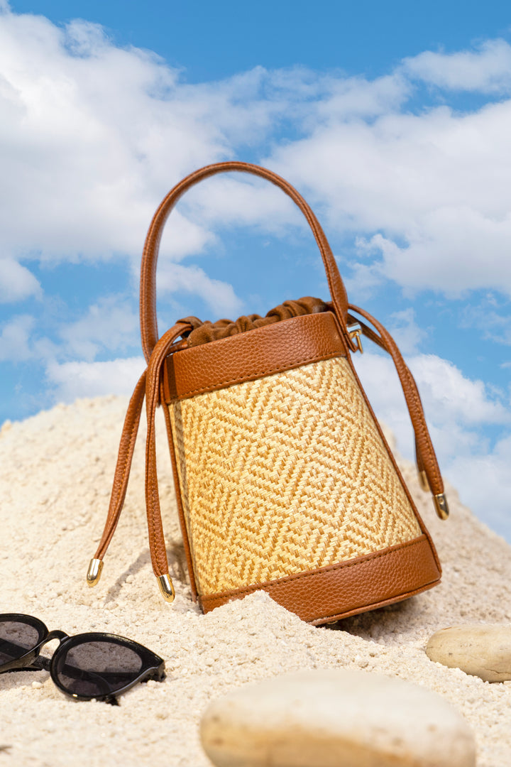 The Amara Bucket – Woven Bamboo Cane & Vegan Leather Handbag (Caramel sand)