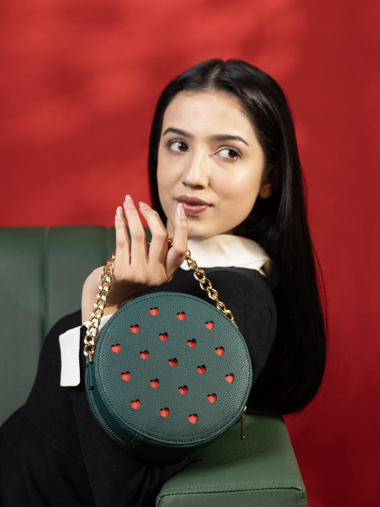 Bottle Green Love Pop Circle sling bag